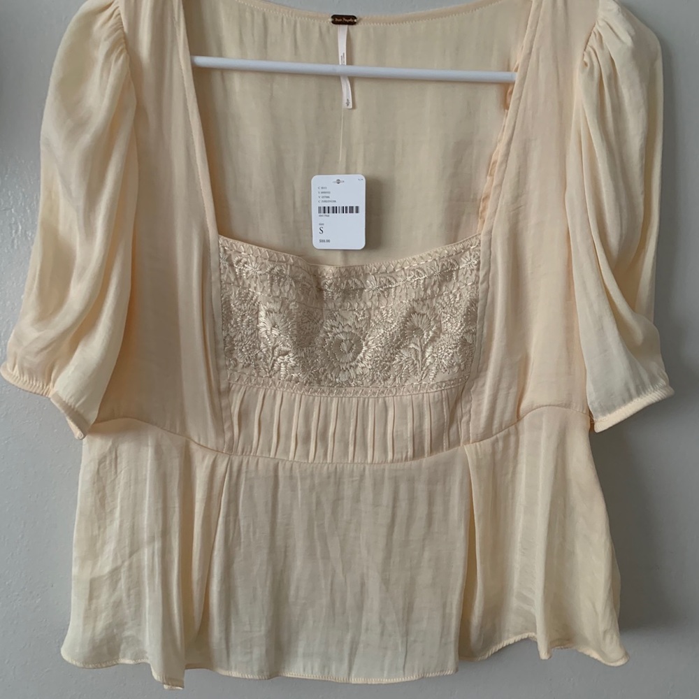 Free people cream colored blouse